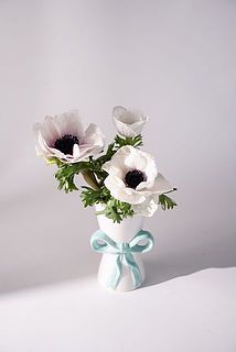 まるでラッピングされた花束をそのまま飾っているよう💐